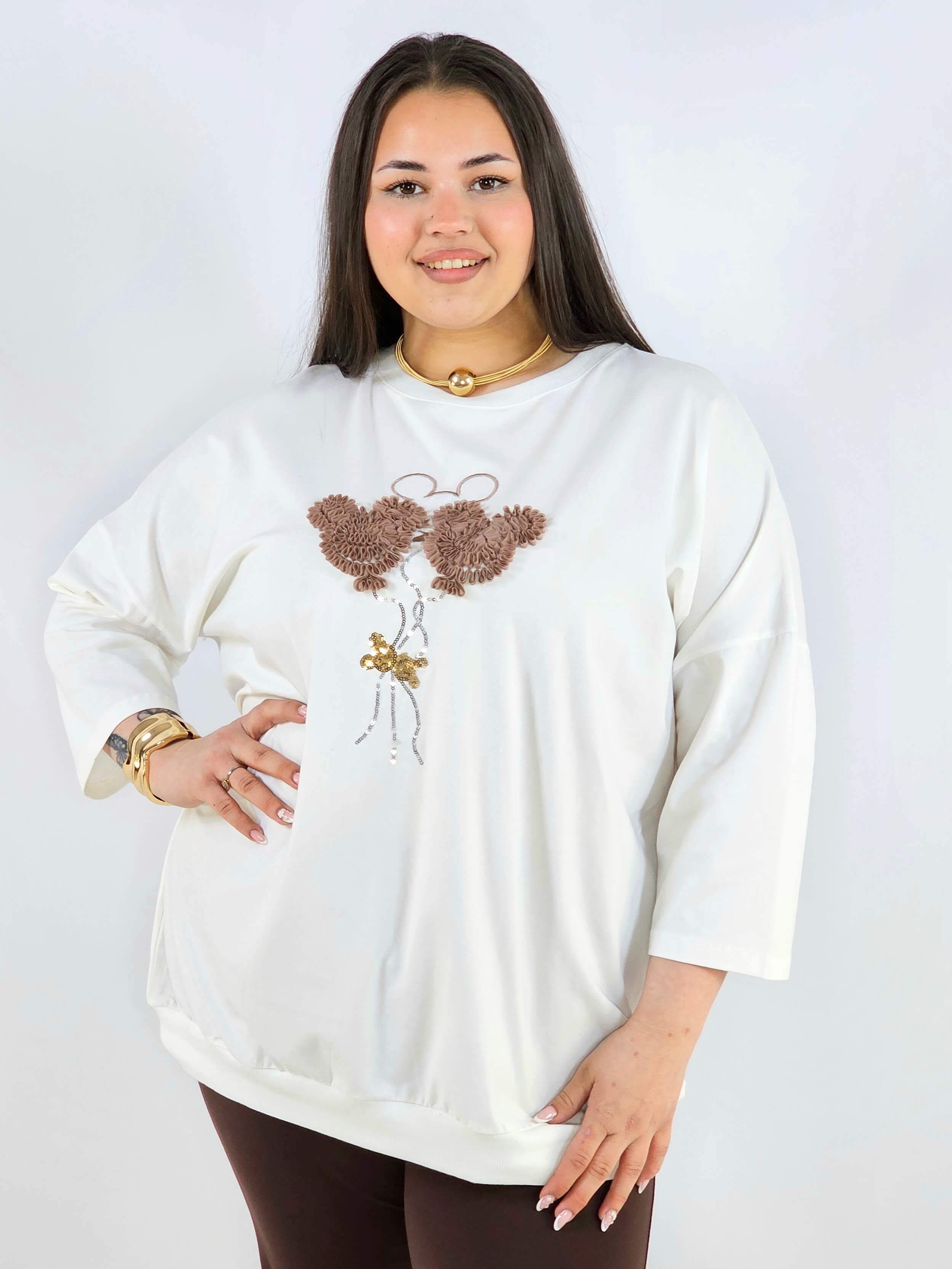 Bluza plus size z ozdobną aplikacją XXL – styl i wygoda Stylowa XL
