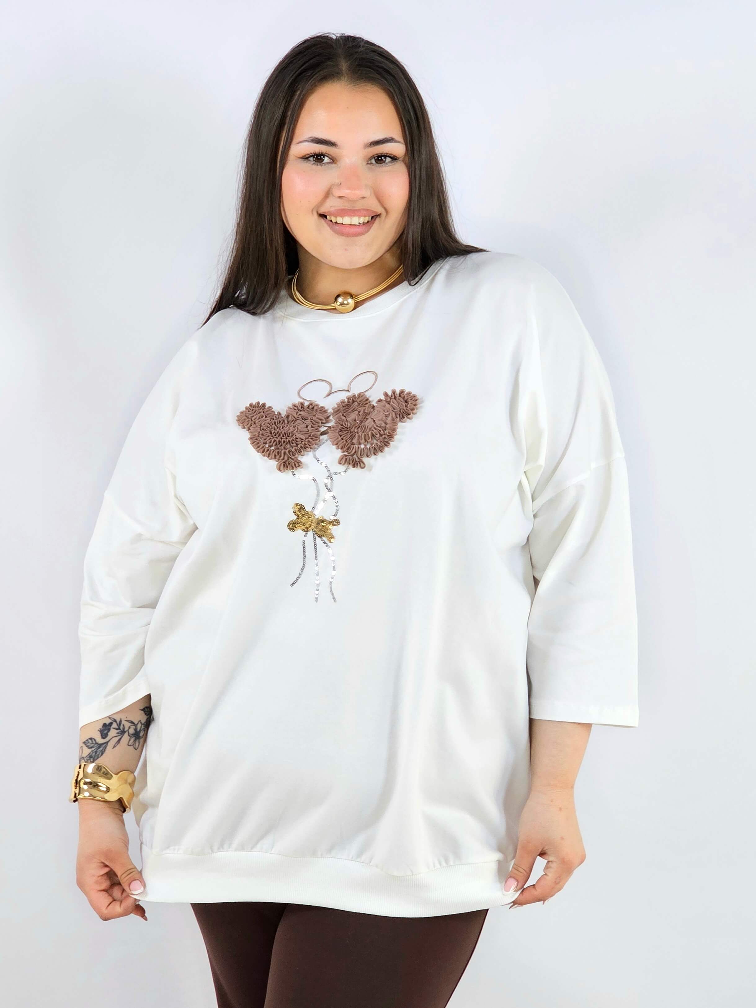 Bluza plus size z ozdobną aplikacją XXL – styl i wygoda Stylowa XL