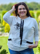 Bluza z kwiatowym nadrukiem i satynowymi detalami Stylowa XL