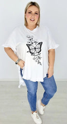 Bluzka bawełniana, rękaw oraz dół bluzki zakończony falbanką. Stylowa XL