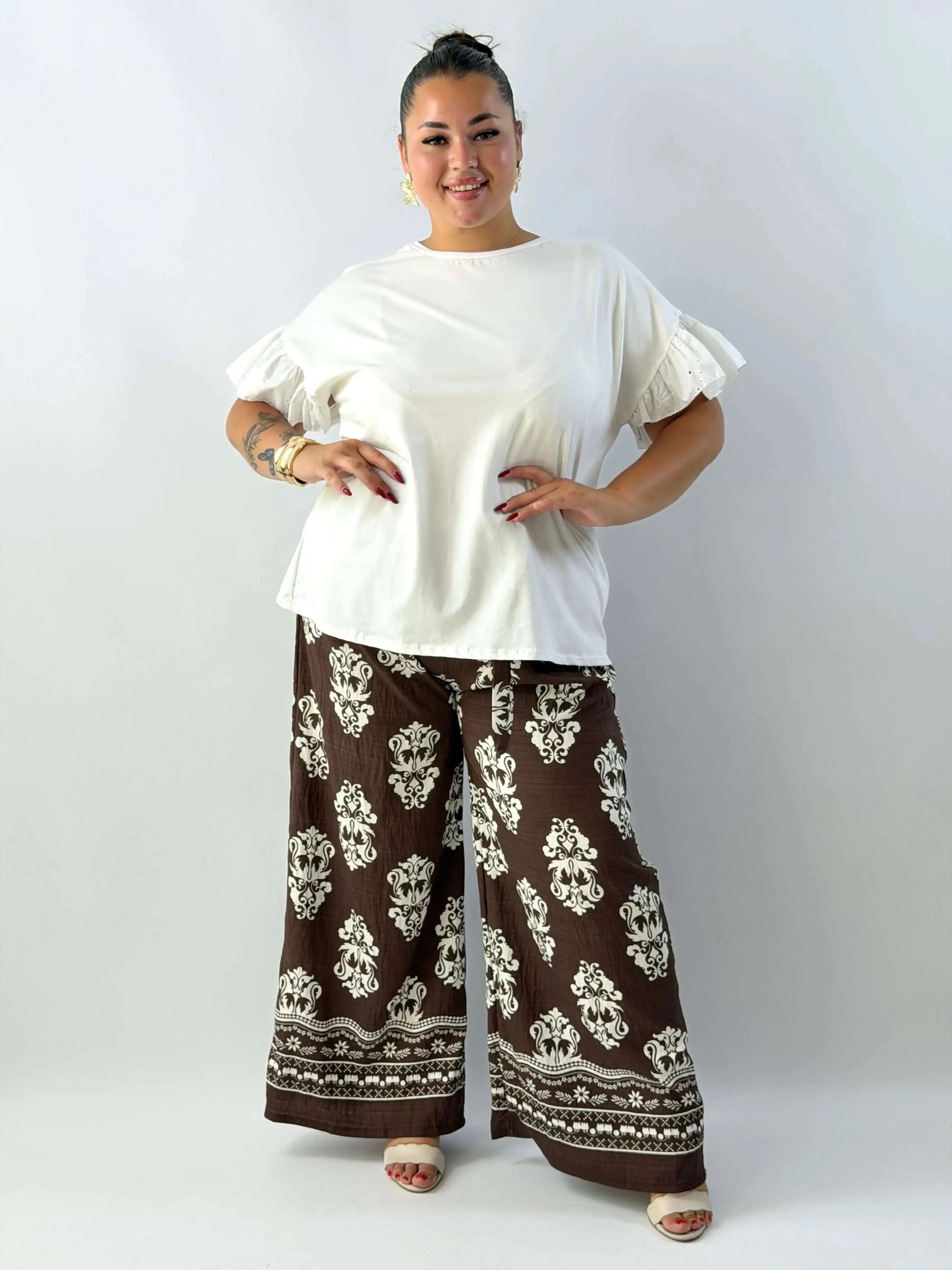 Bluzka damska plus size z haftowanymi rękawami – wygoda i subtelna elegancja Stylowa XL