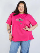 Bluzka plus size XXL z delikatnym kwiatem – stylowa i ponadczasowa Stylowa XL