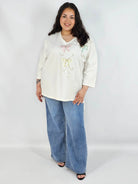 Bluzka plus size XXL z efektownym zdobieniem – lekkość i styl na każdą okazję Stylowa XL