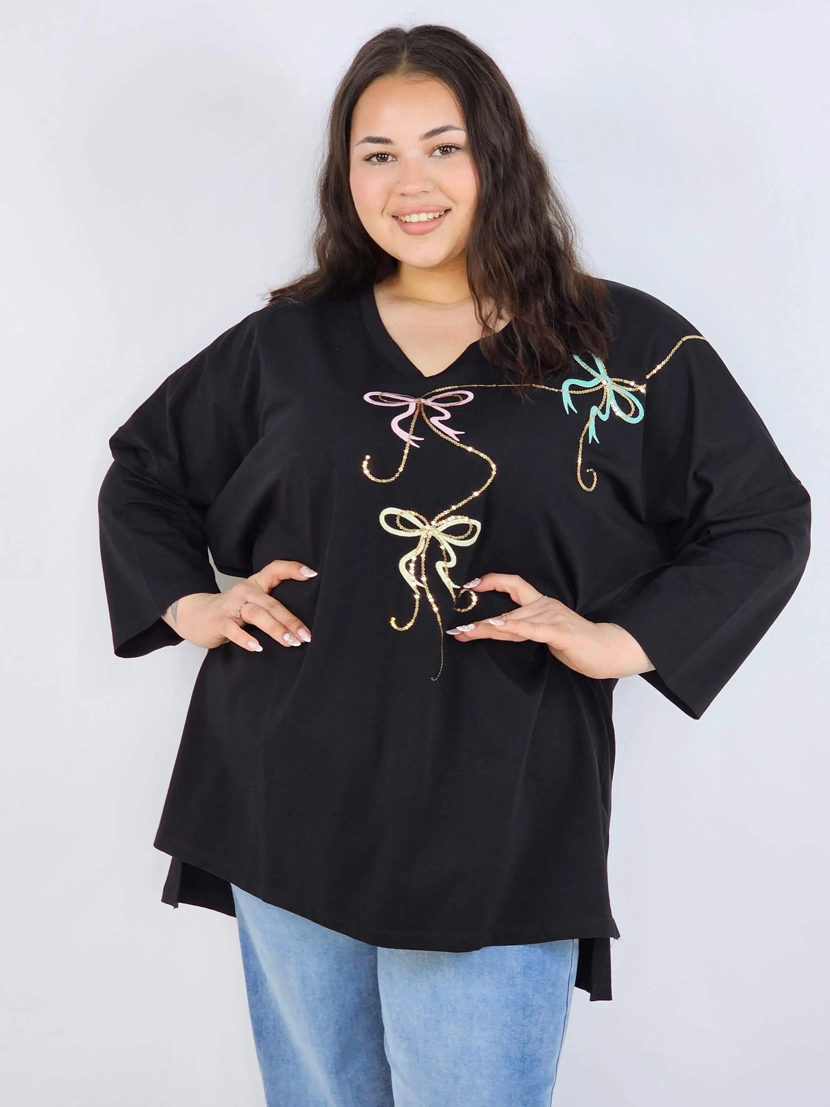 Bluzka plus size XXL z efektownym zdobieniem – lekkość i styl na każdą okazję Stylowa XL