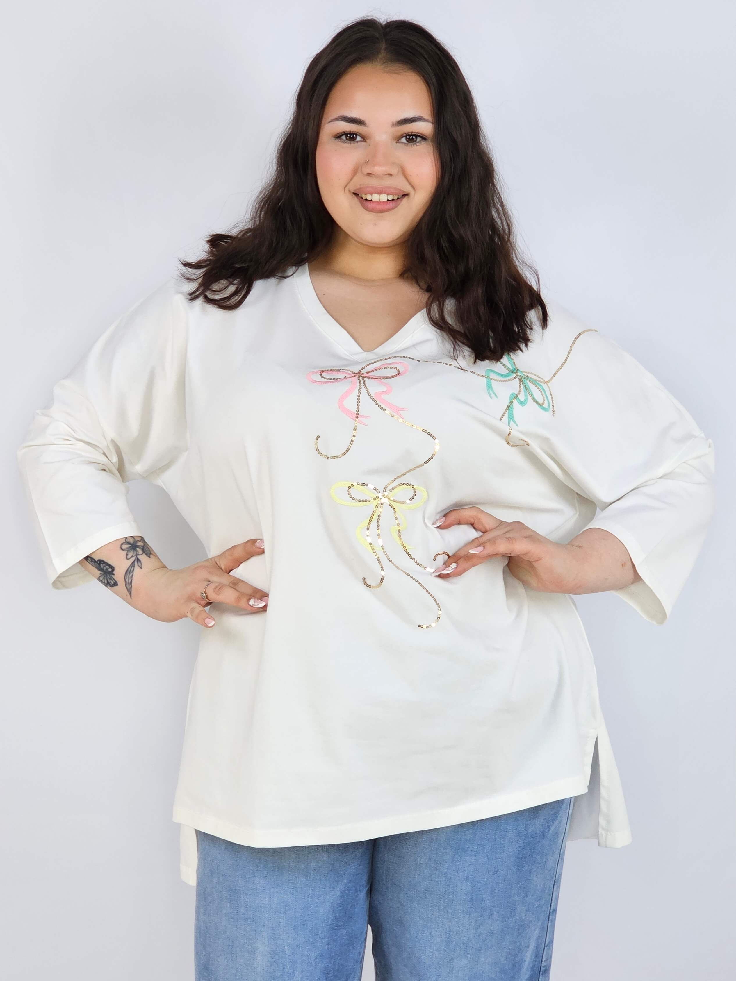 Bluzka plus size XXL z efektownym zdobieniem – lekkość i styl na każdą okazję Stylowa XL