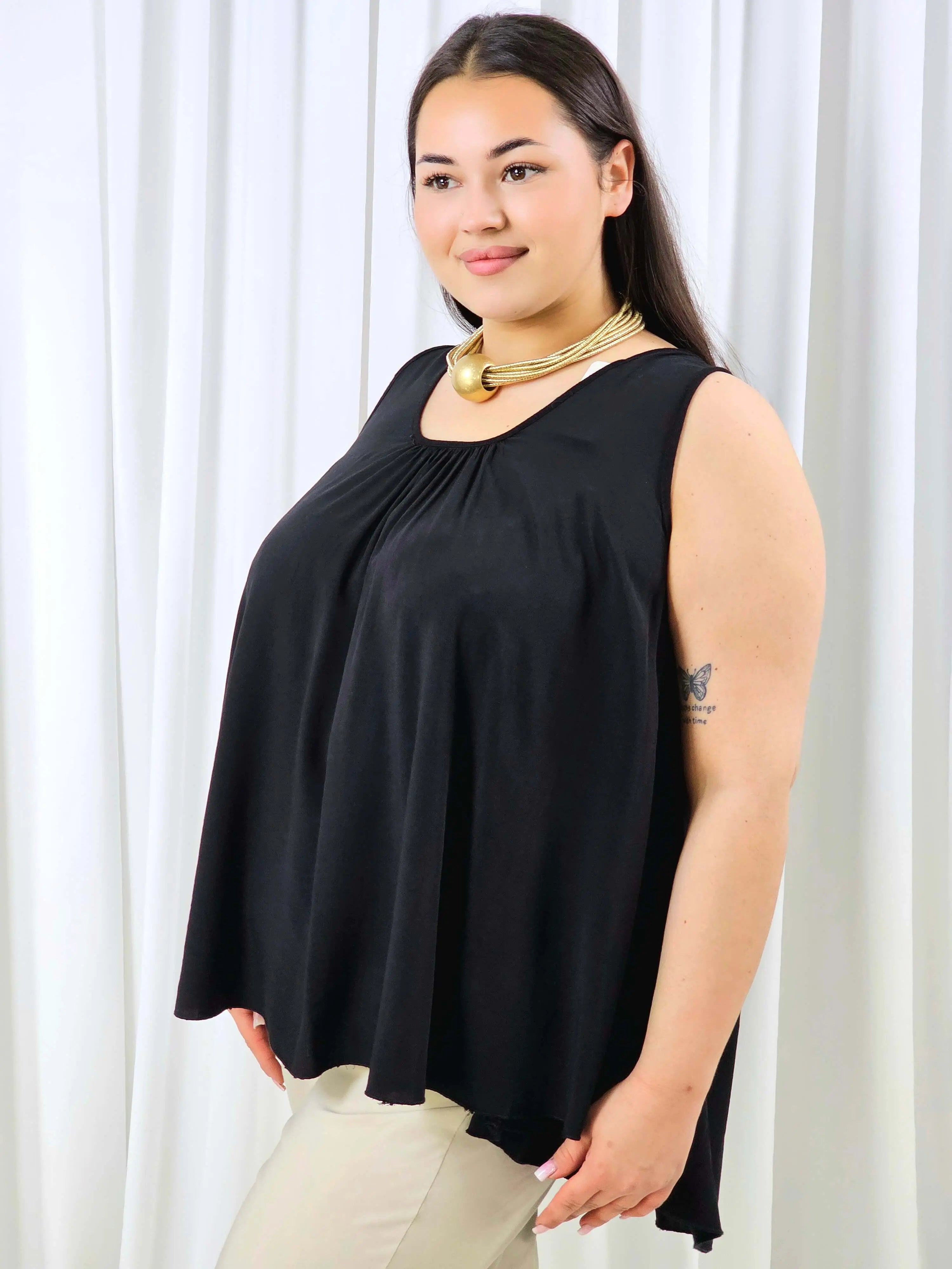 Bluzka plus size bez rękawów z koronką na plecach – lekka tunika XXL Stylowa XL