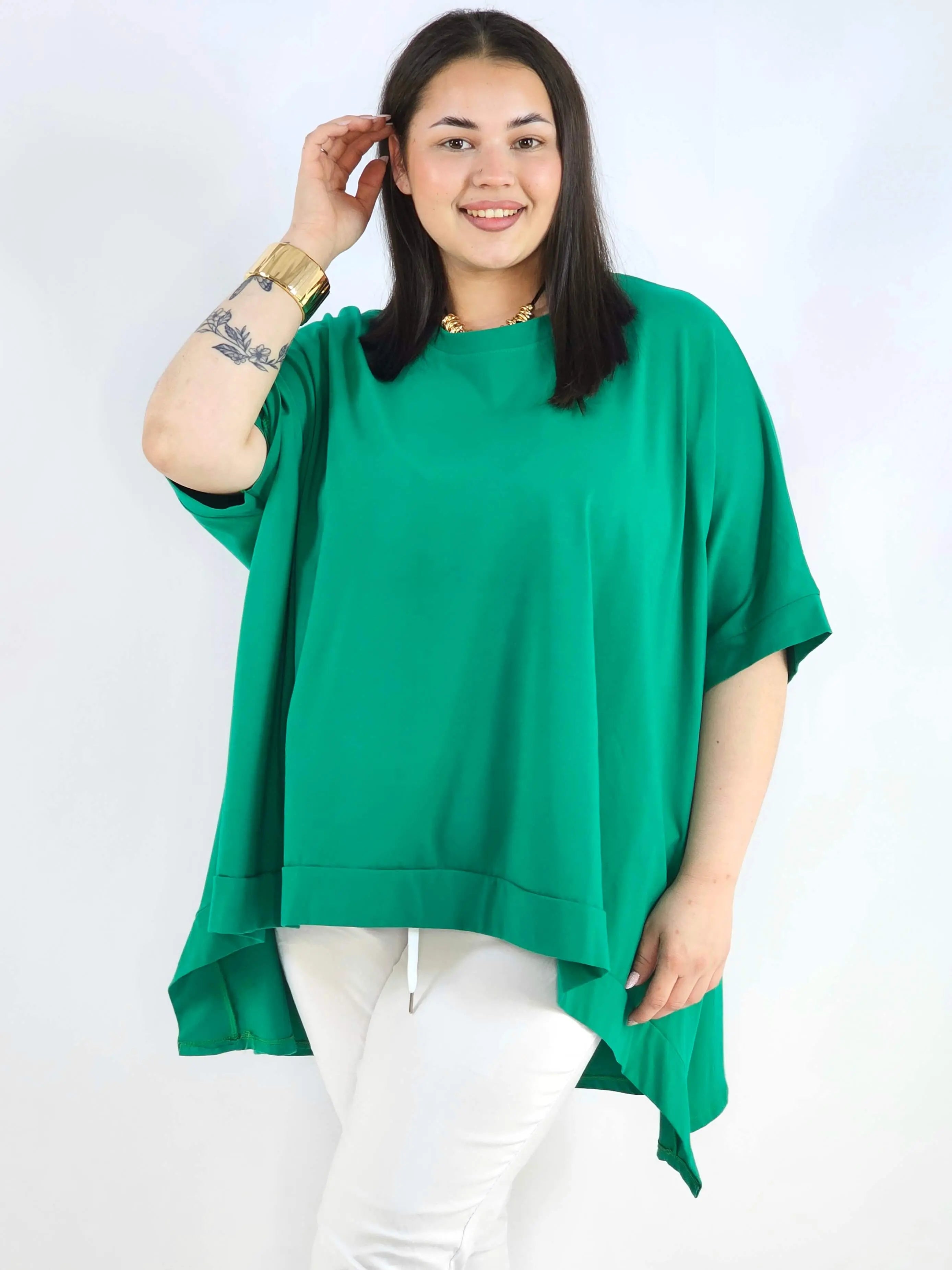 Bluzka plus size oversize z asymetrycznym dołem – wygodna bluzka damska XXL Stylowa XL