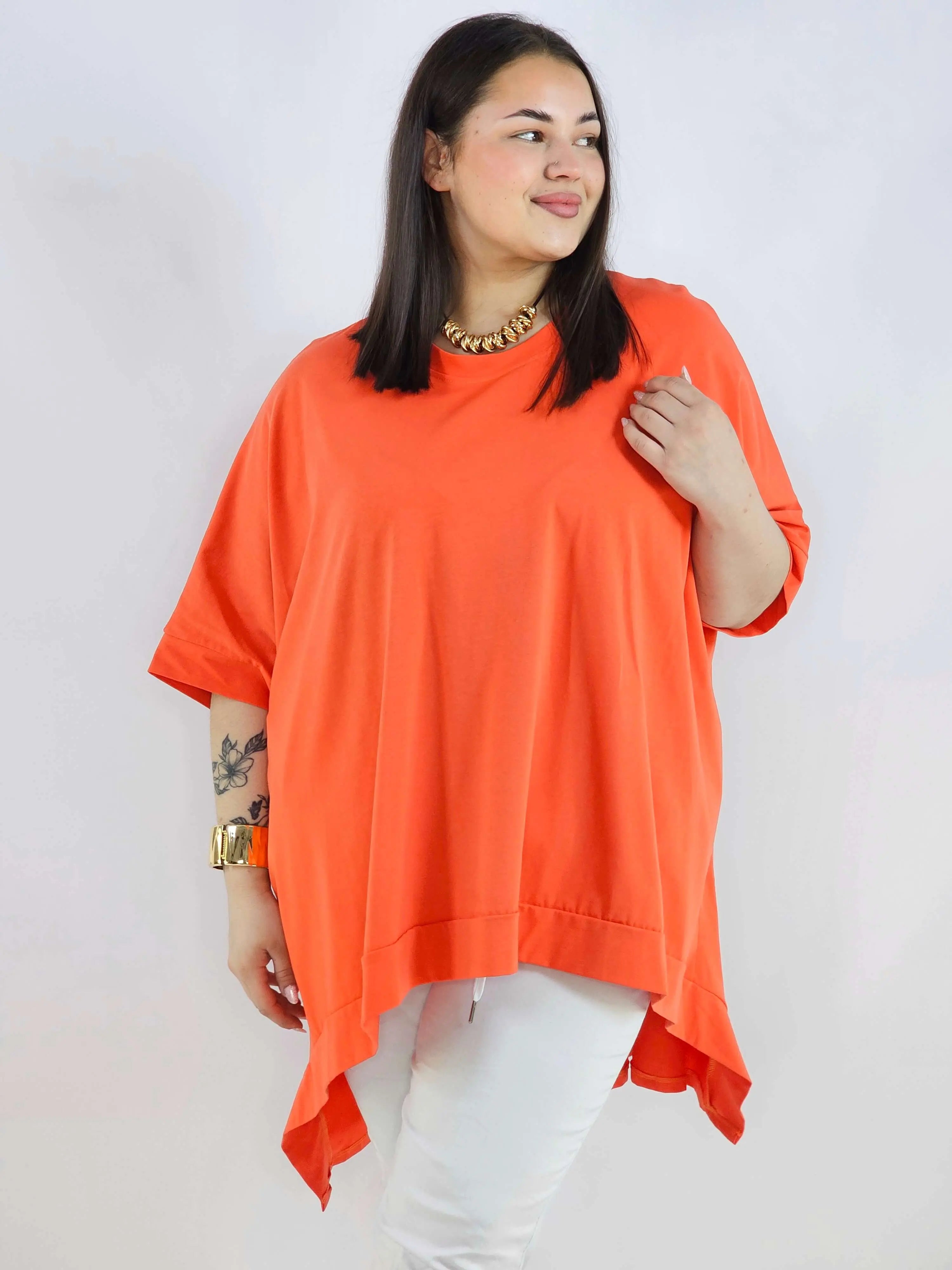 Bluzka plus size oversize z asymetrycznym dołem – wygodna bluzka damska XXL Stylowa XL