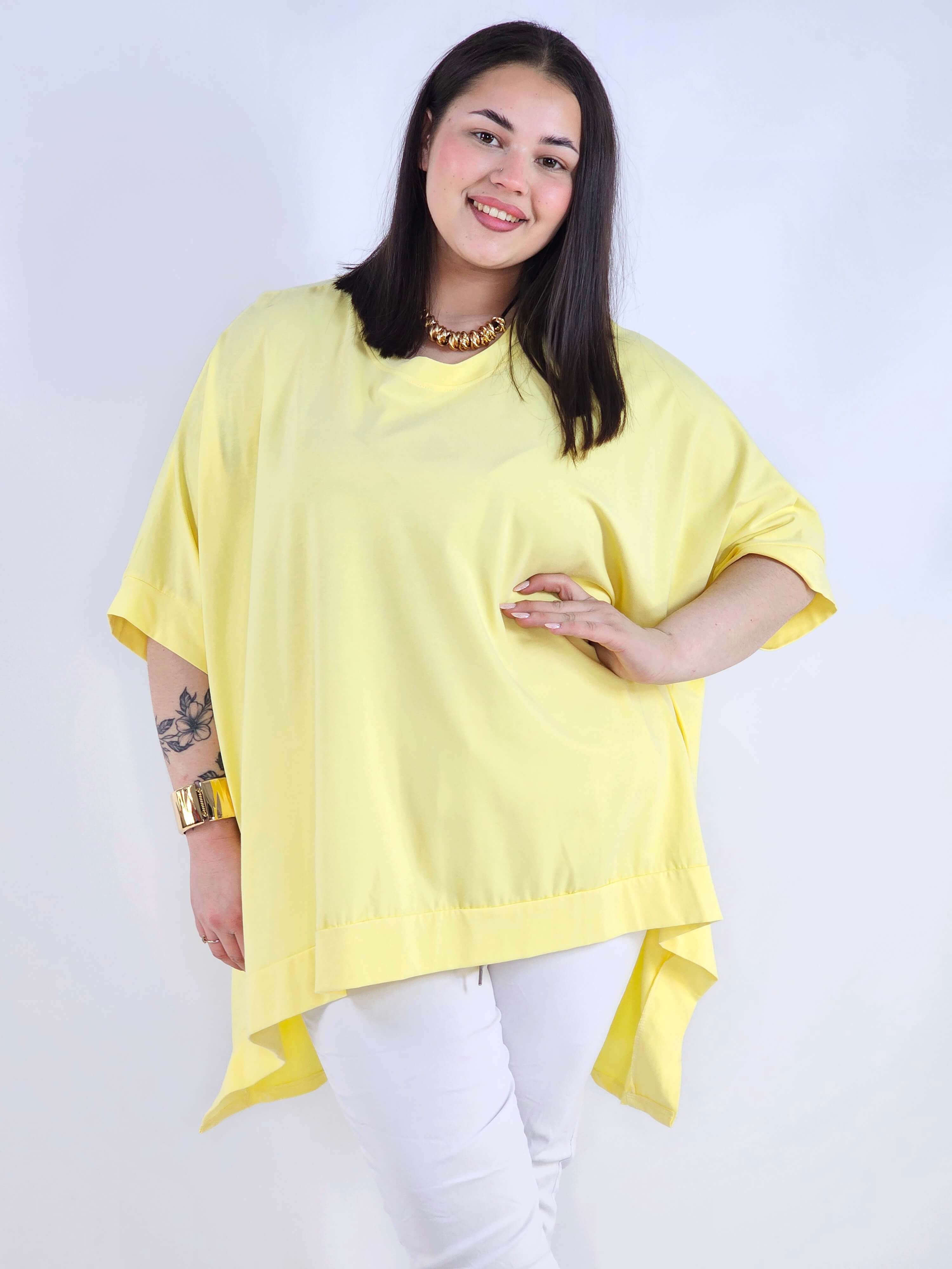 Bluzka plus size oversize z asymetrycznym dołem – wygodna bluzka damska XXL Stylowa XL