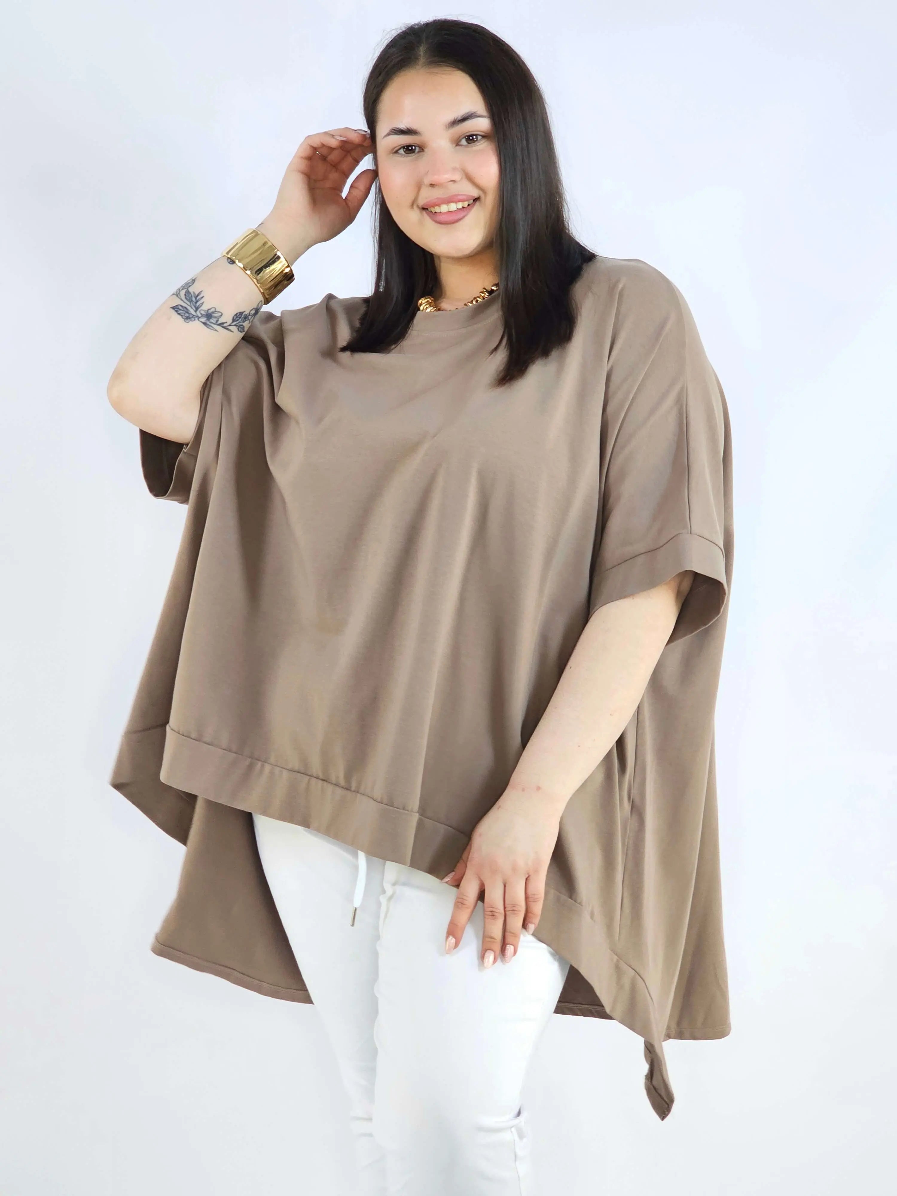 Bluzka plus size oversize z asymetrycznym dołem – wygodna bluzka damska XXL Stylowa XL