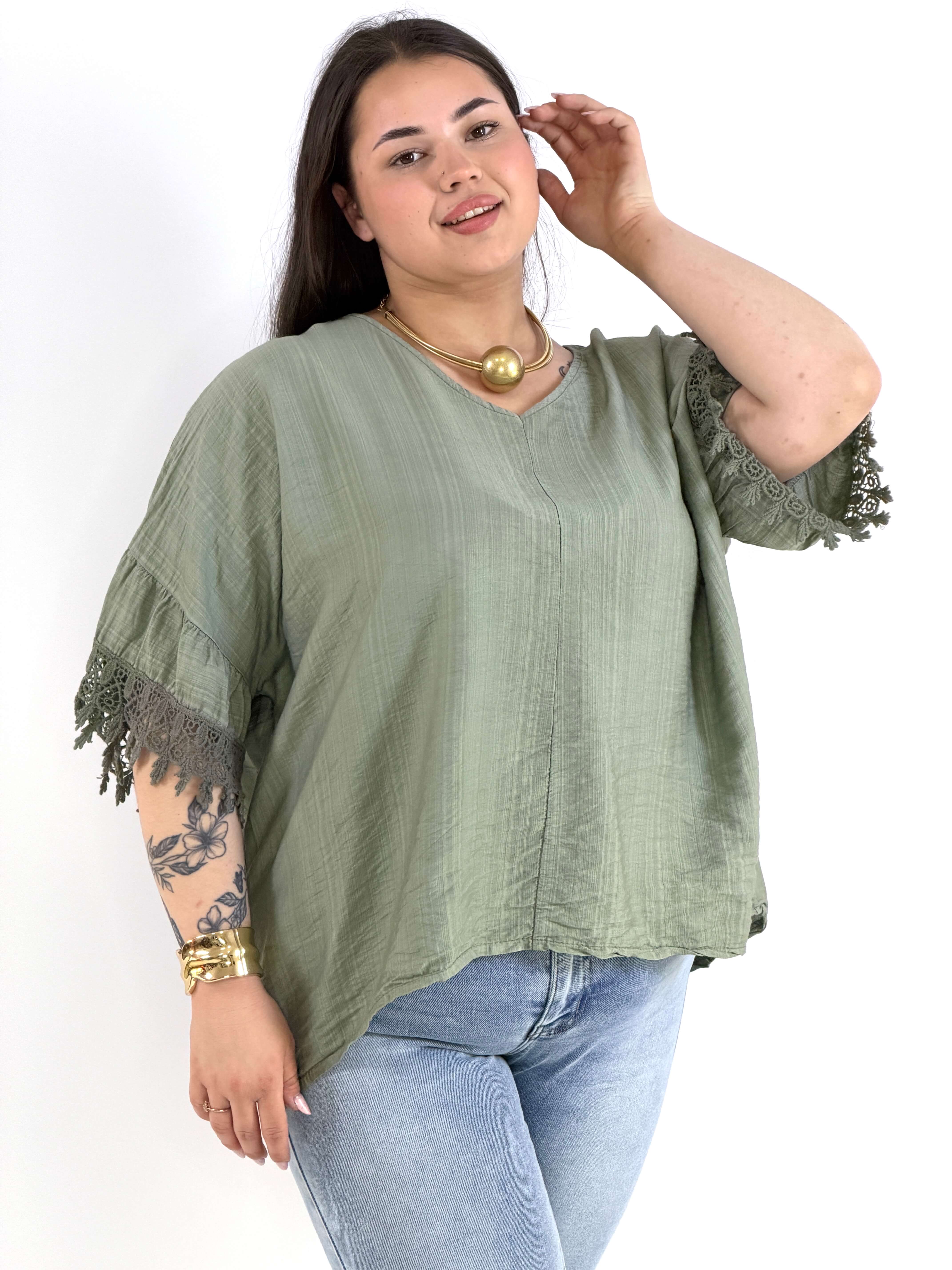 Bluzka plus size oversize z koronkowym rękawem – lekka i stylowa Stylowa XL