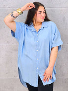 Bluzka plus size oversize zapinana na guziki – wygodny model XXL dla kobiet Stylowa XL