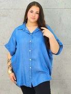 Bluzka plus size oversize zapinana na guziki – wygodny model XXL dla kobiet Stylowa XL