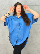 Bluzka plus size oversize zapinana na guziki – wygodny model XXL dla kobiet Stylowa XL