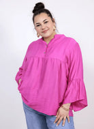 Bluzka plus size tunika z guzikami i falbankowym rękawem Stylowa XL