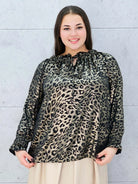 Bluzka plus size w panterkę ze złotym połyskiem – stylowa i z charakterem Stylowa XL Stylowa XL