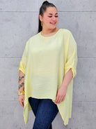Bluzka plus size z asymetrycznym dołem – lekka i stylowa tunika XXL Stylowa XL