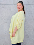 Bluzka plus size z asymetrycznym dołem – lekka i stylowa tunika XXL Stylowa XL