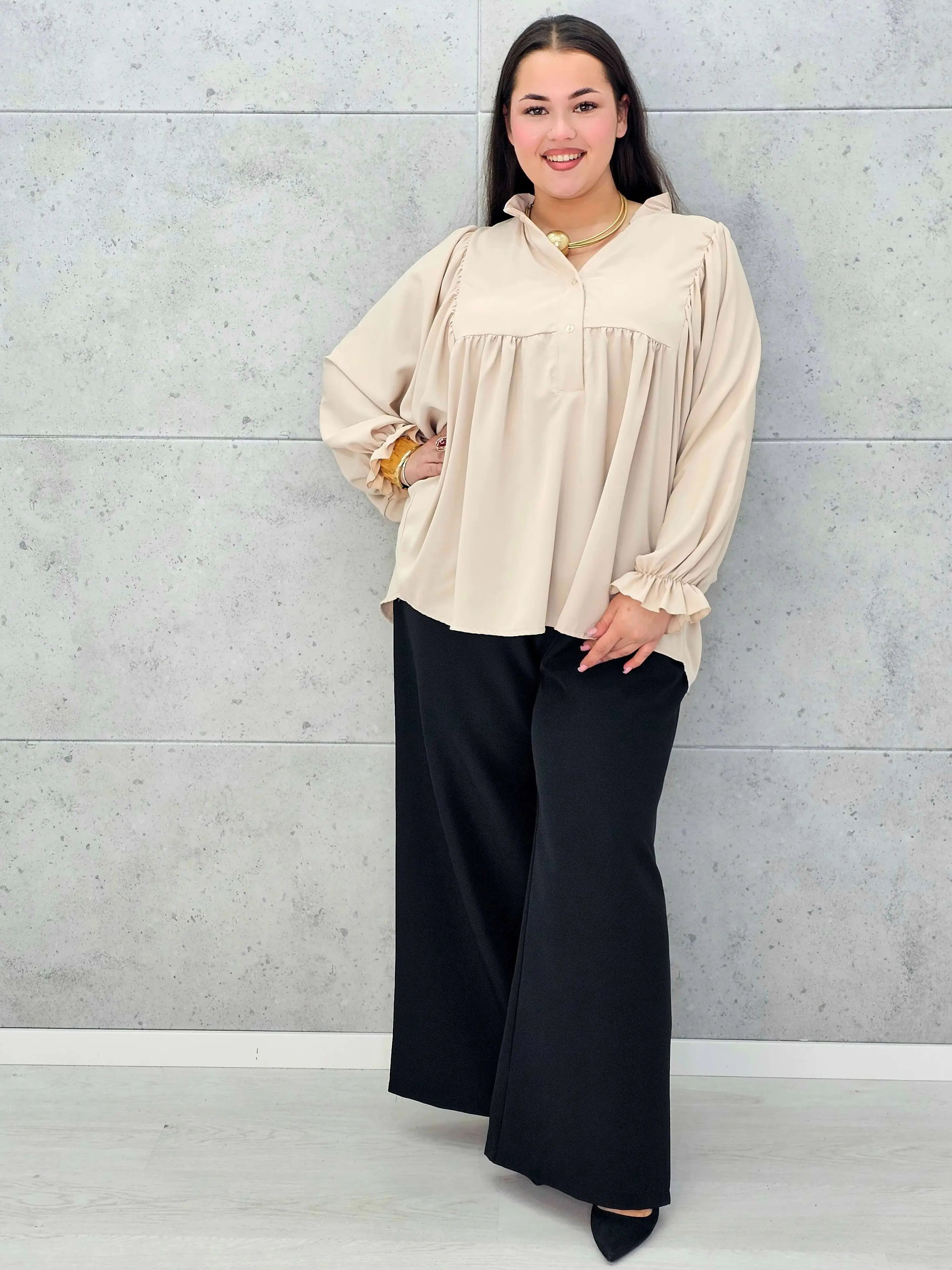 Bluzka plus size z bufiastymi rękawami. Stylowa XL