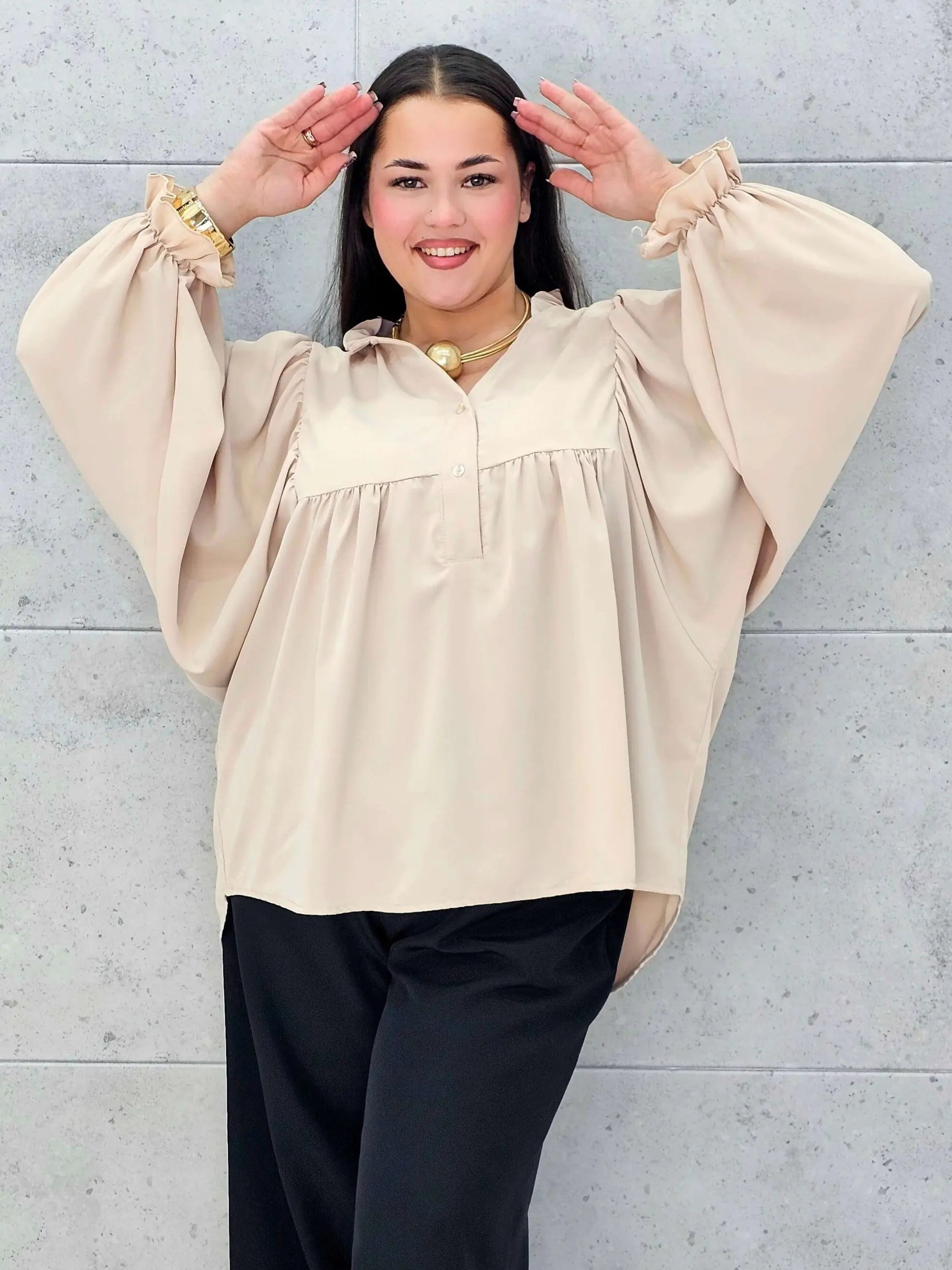 Bluzka plus size z bufiastymi rękawami. Stylowa XL