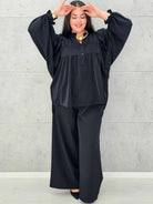 Bluzka plus size z bufiastymi rękawami. Stylowa XL