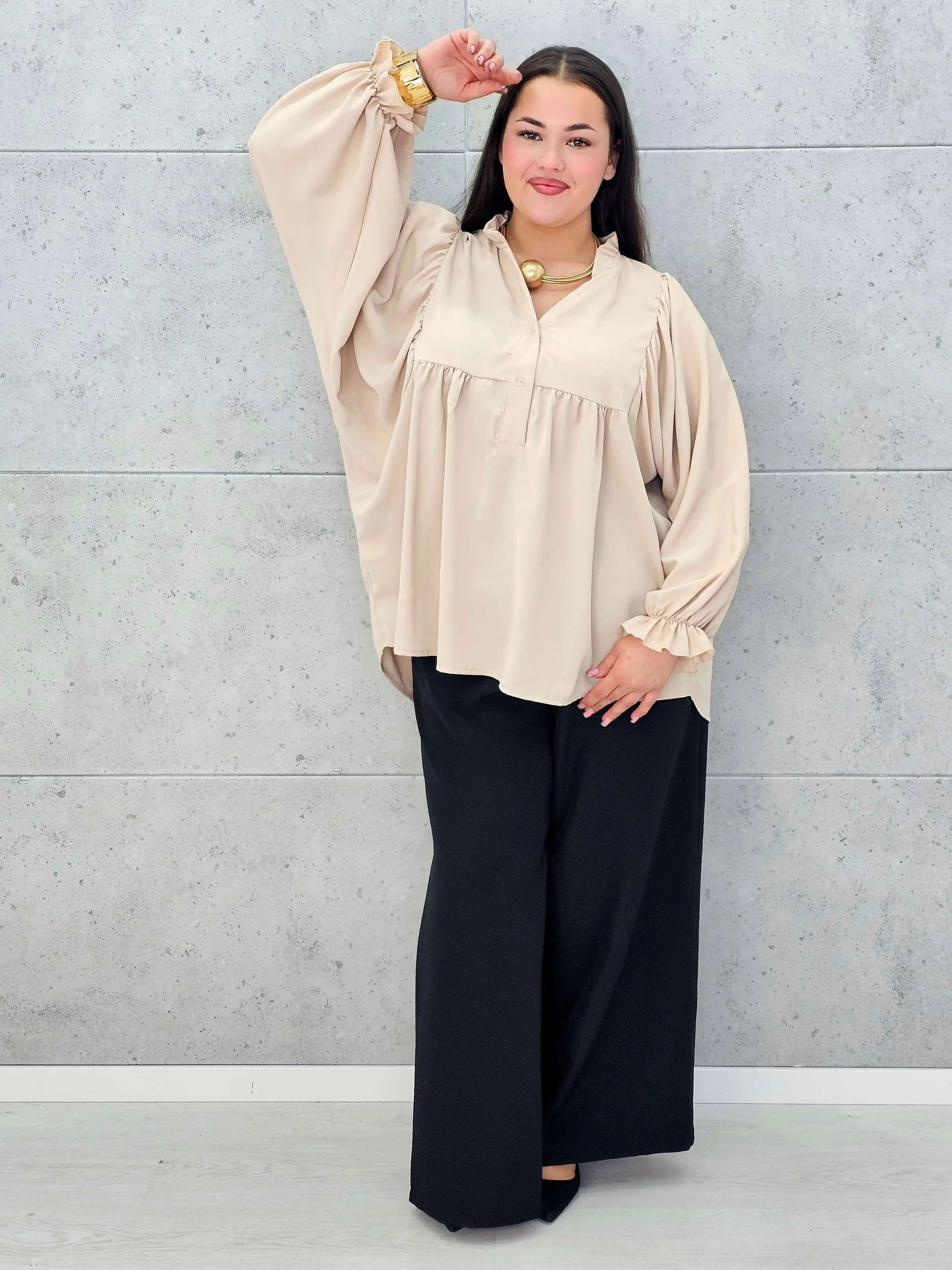 Bluzka plus size z bufiastymi rękawami. Stylowa XL