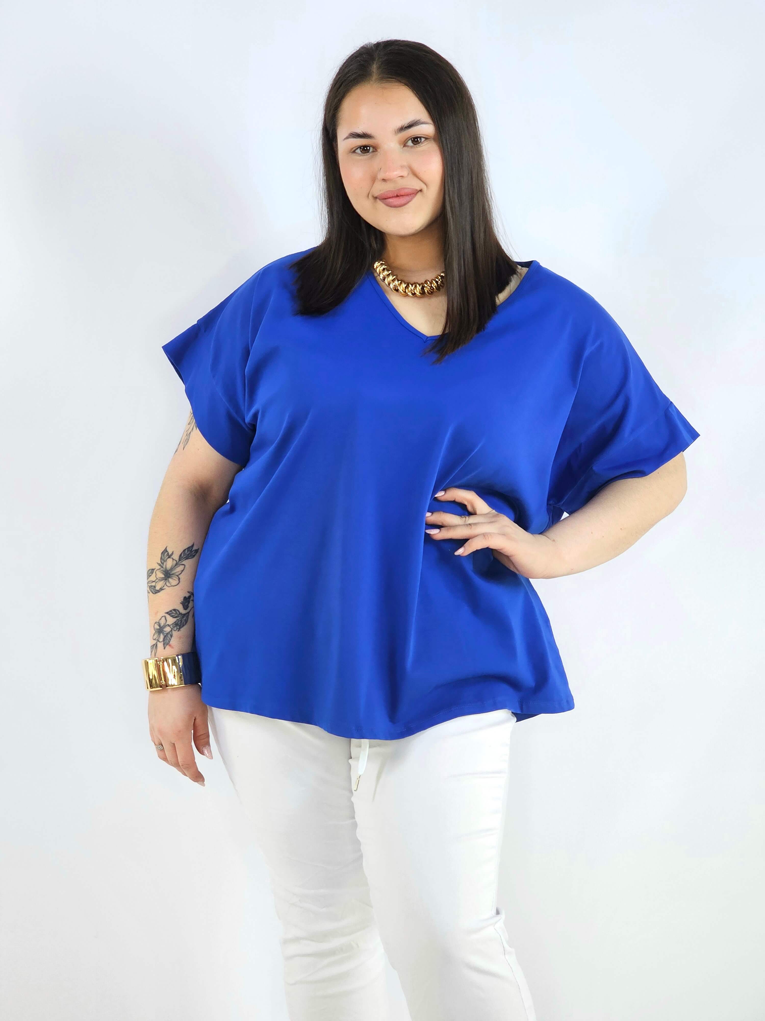 Bluzka plus size z dekoltem V – klasyczna, wygodna i uniwersalna Stylowa XL
