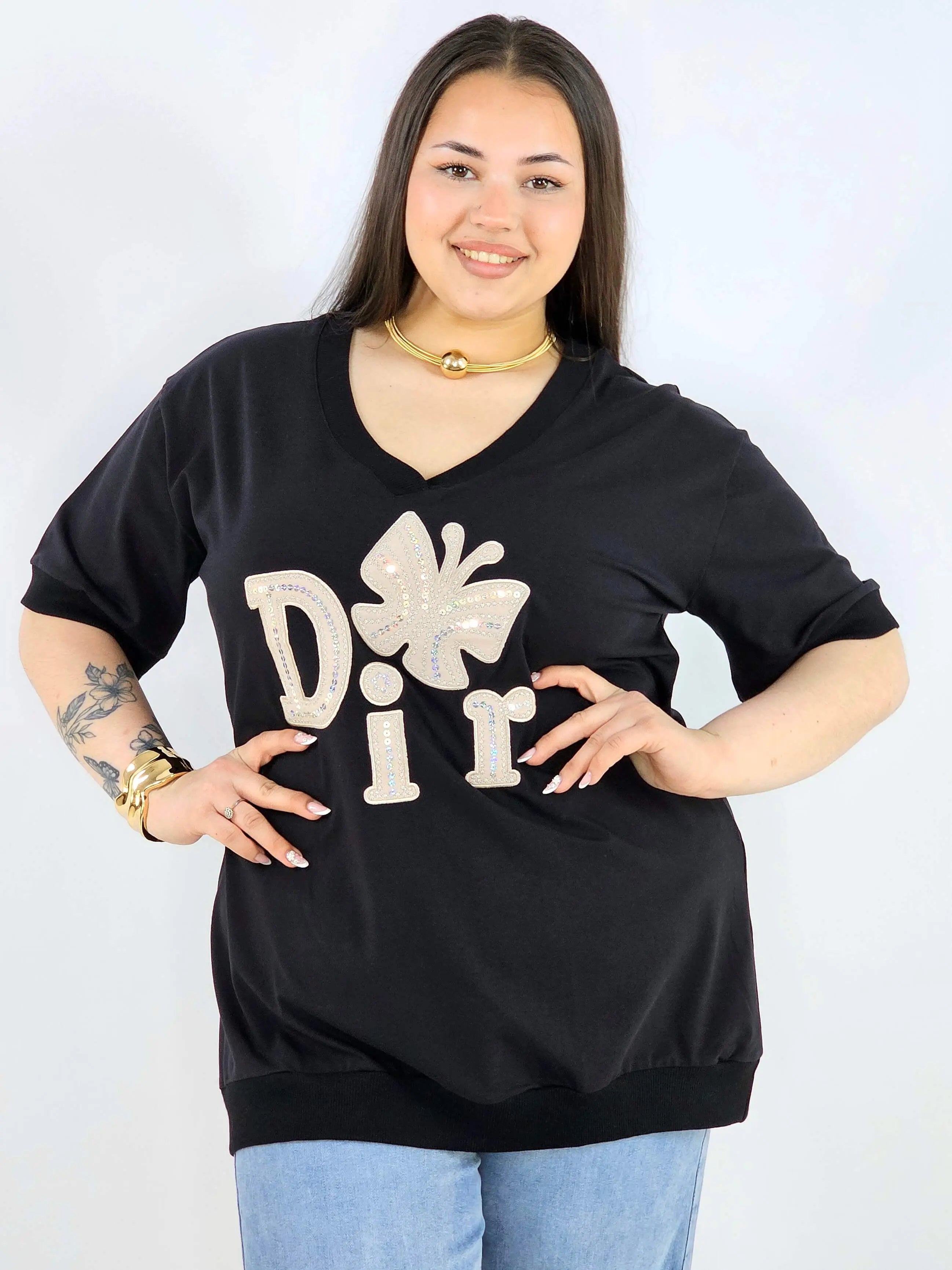 Bluzka plus size z dekoltem V i ozdobnym napisem Stylowa XL
