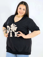 Bluzka plus size z dekoltem V i ozdobnym napisem Stylowa XL