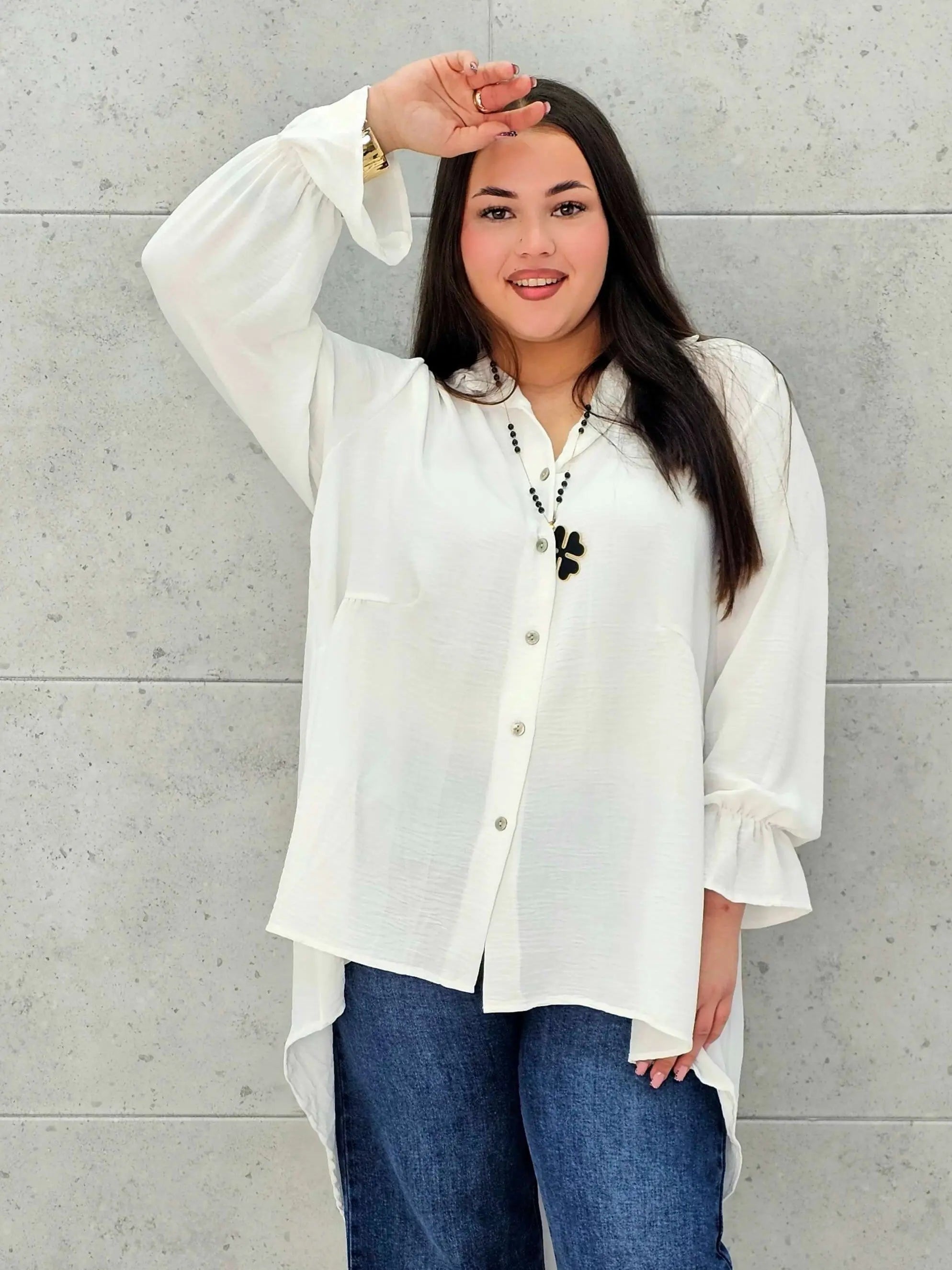 Bluzka plus size z dłuższym tyłem i eleganckim fasonem - Stylowa XL