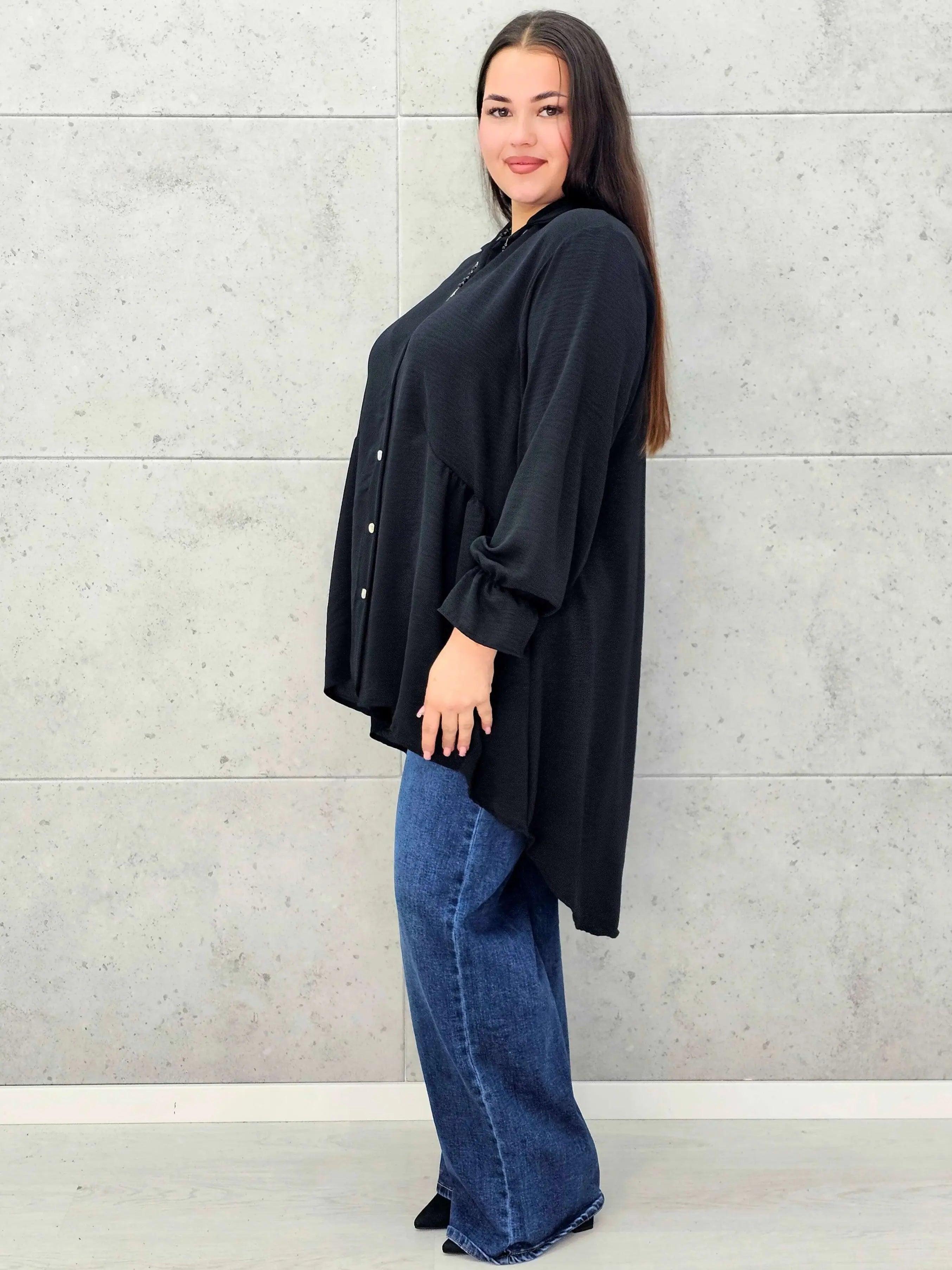 Bluzka plus size z dłuższym tyłem i eleganckim fasonem - Stylowa XL