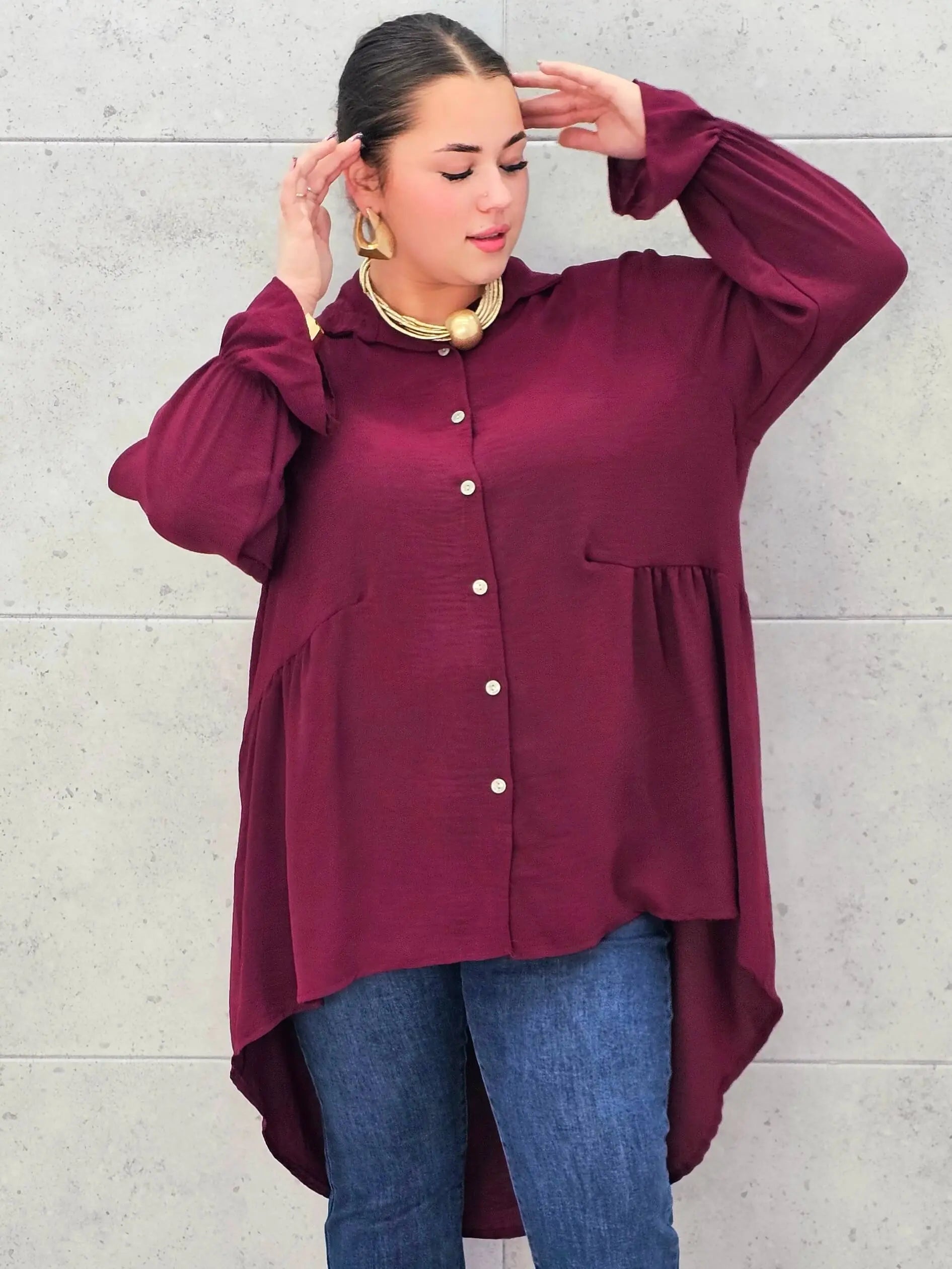 Bluzka plus size z dłuższym tyłem i eleganckim fasonem Stylowa XL