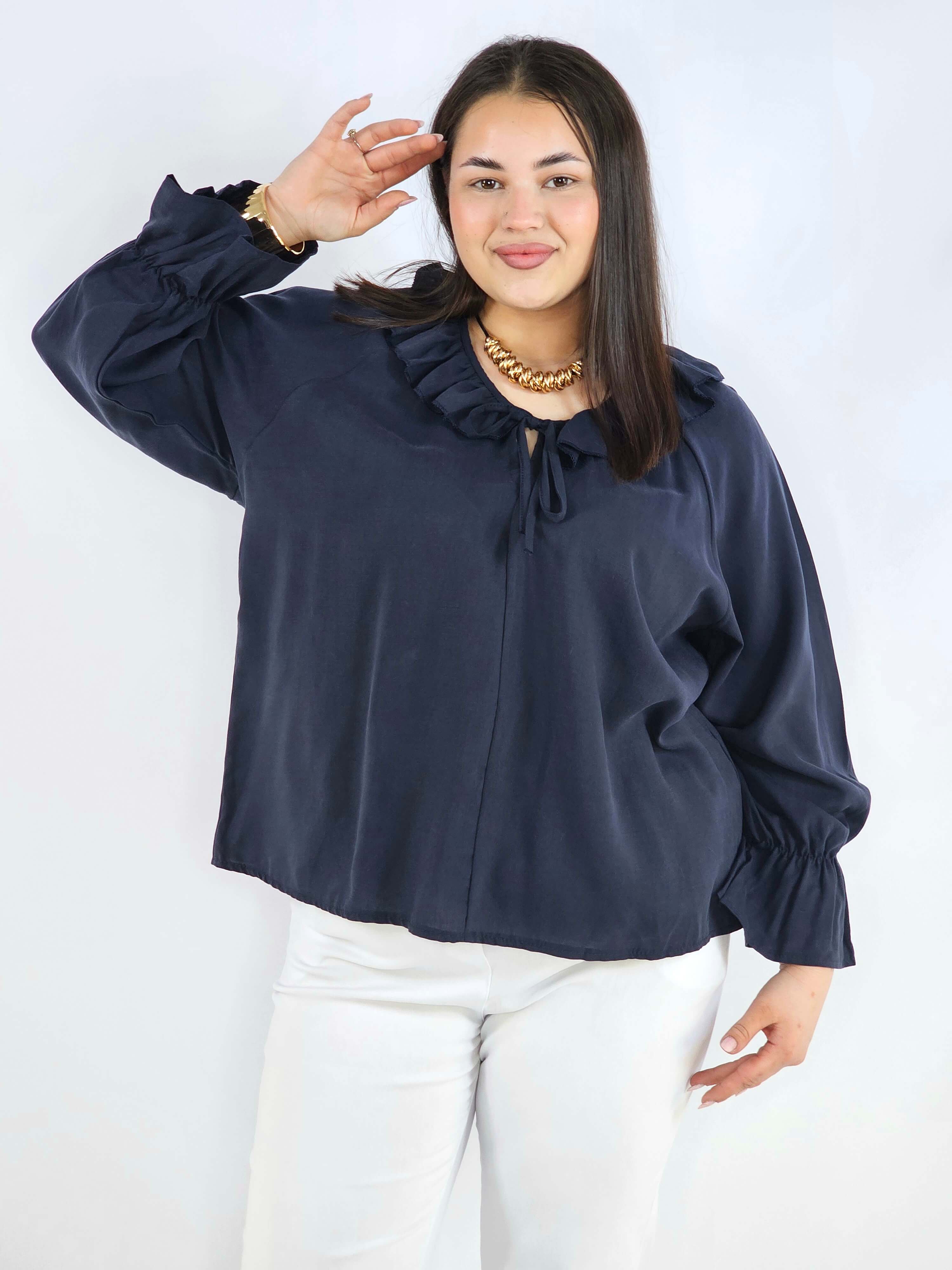 Bluzka plus size z falbaną – romantyczna elegancja w lekkim wydaniu Stylowa XL