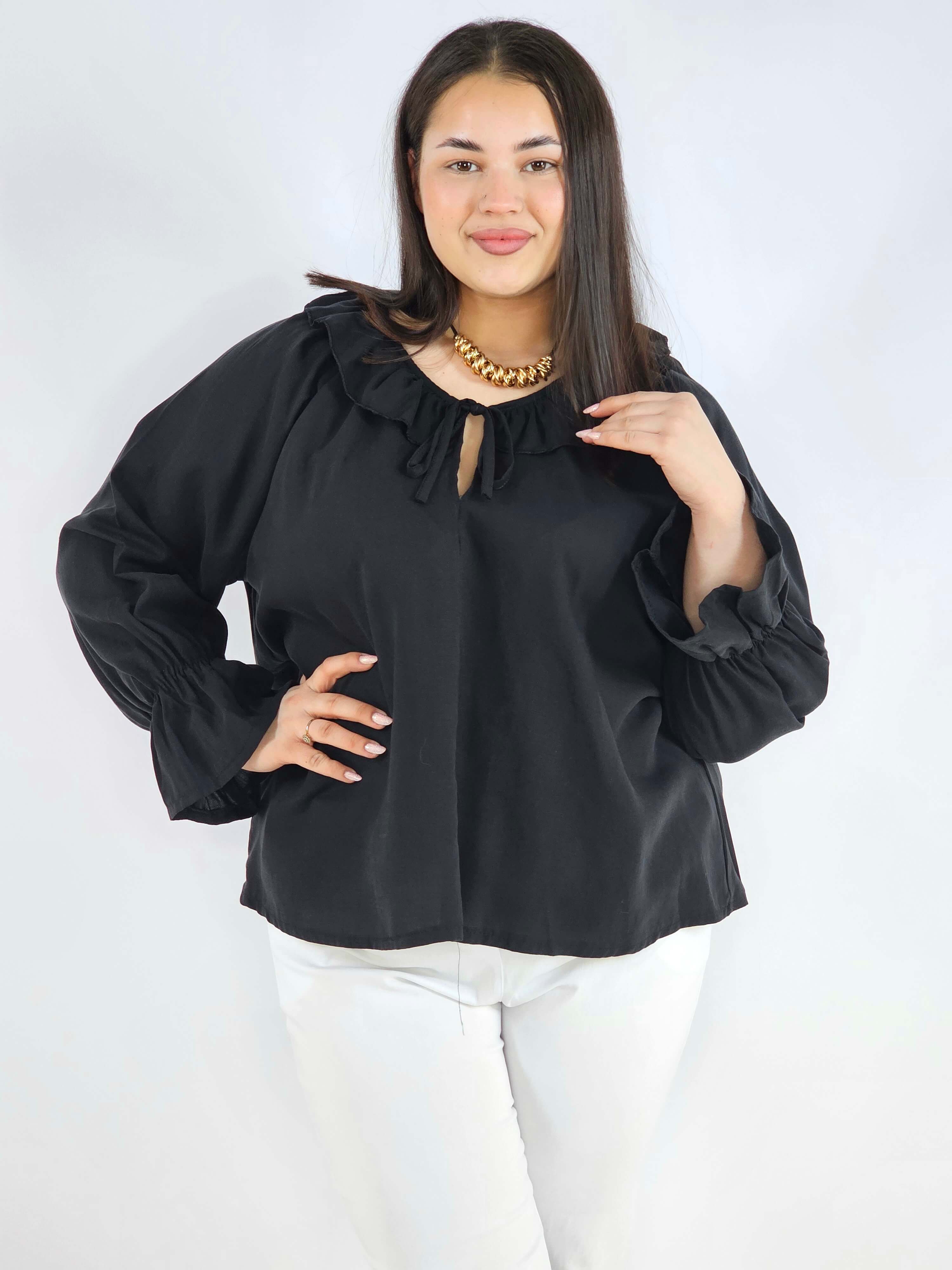 Bluzka plus size z falbaną – romantyczna elegancja w lekkim wydaniu Stylowa XL