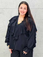 Bluzka plus size z falbanami – romantyczny szyk i wygoda w eleganckim stylu - Stylowa XL