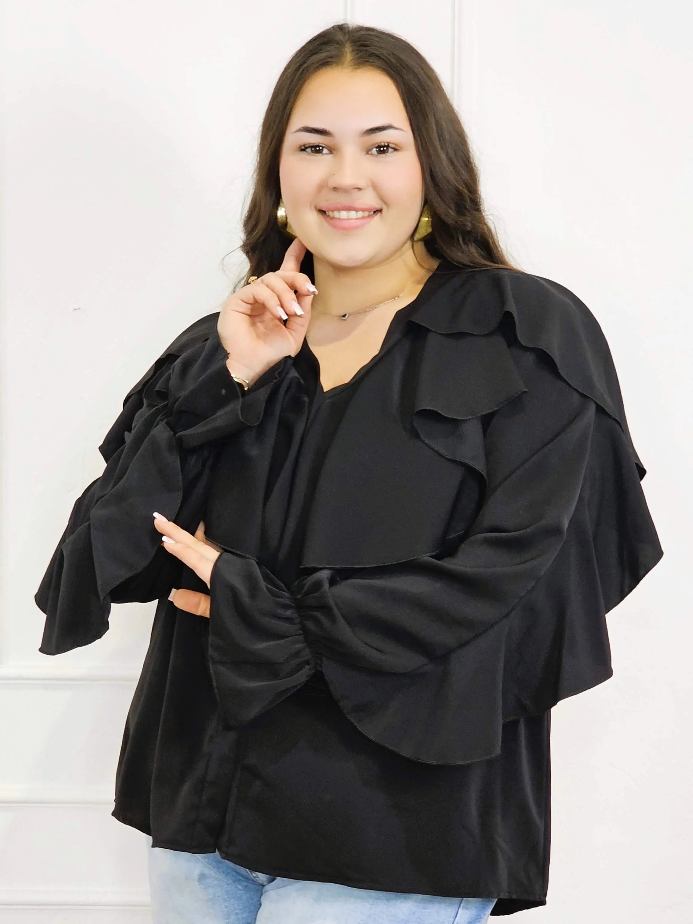 Bluzka plus size z falbanami – romantyczny szyk i wygoda w eleganckim stylu Stylowa XL