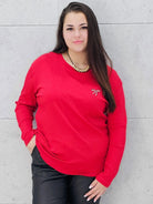 Bluzka plus size z kokardką – elegancka i wygodna propozycja dla każdej sylwetki Stylowa XL