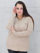 Bluzka plus size z kokardką – elegancka i wygodna propozycja dla każdej sylwetki Stylowa XL