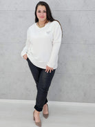 Bluzka plus size z kokardką – elegancka i wygodna propozycja dla każdej sylwetki Stylowa XL