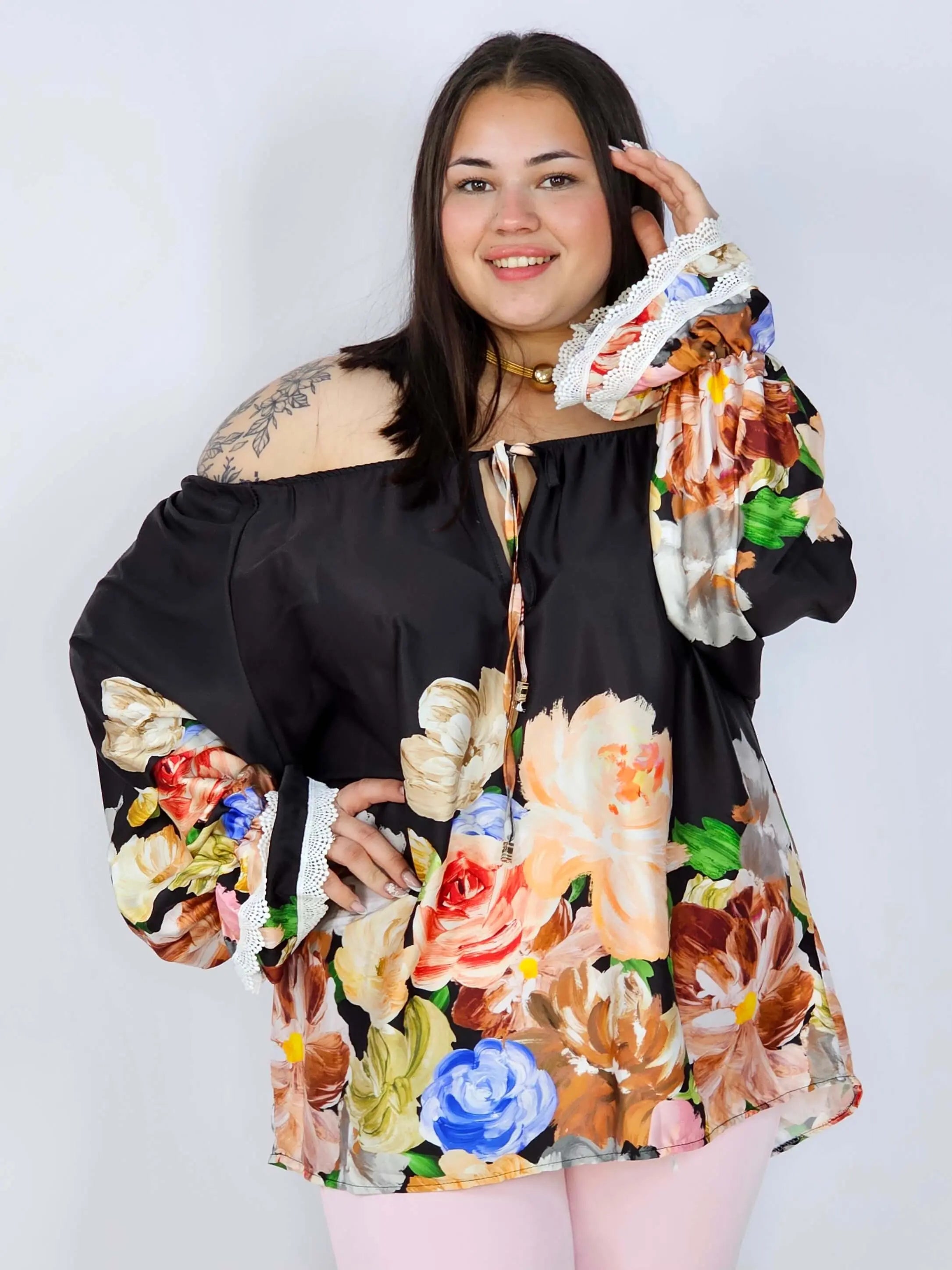 Bluzka plus size z kwiatowym printem i wiązaniem Stylowa XL
