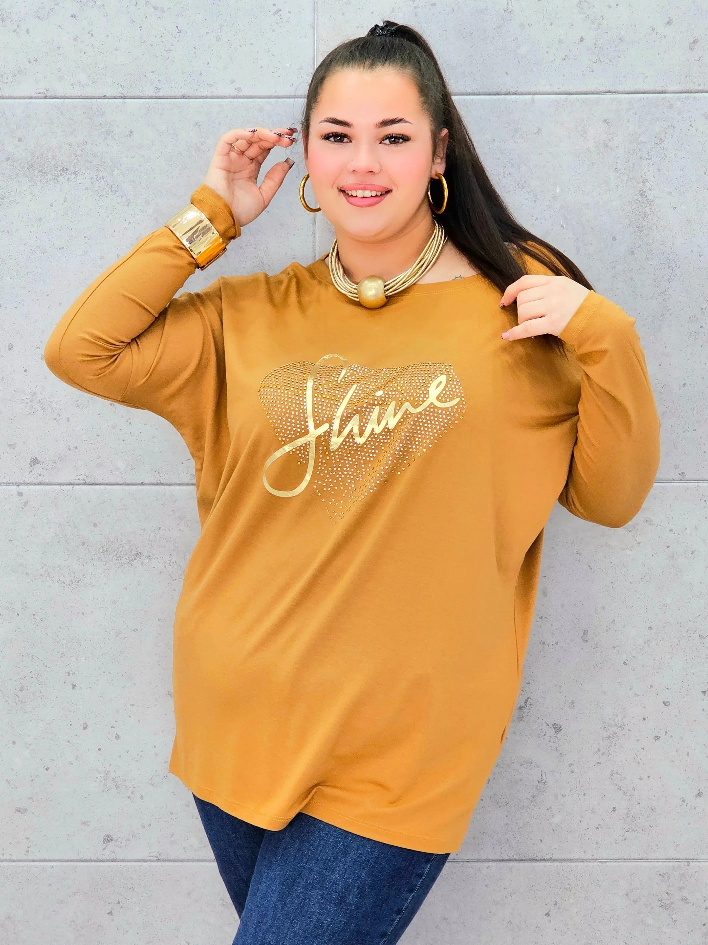 Bluzka plus size z nadrukiem SHINE – modny i wygodny look XXL Stylowa XL
