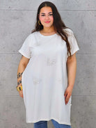 Bluzka plus size z połyskującymi motylami – elegancja i wygoda w jednym Stylowa XL