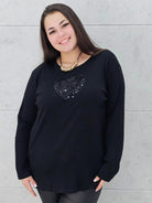 Bluzka plus size z serduszkiem – kobiecy blask w wersji XL Stylowa XL