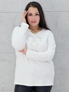 Bluzka plus size z serduszkiem – kobiecy blask w wersji XL Stylowa XL