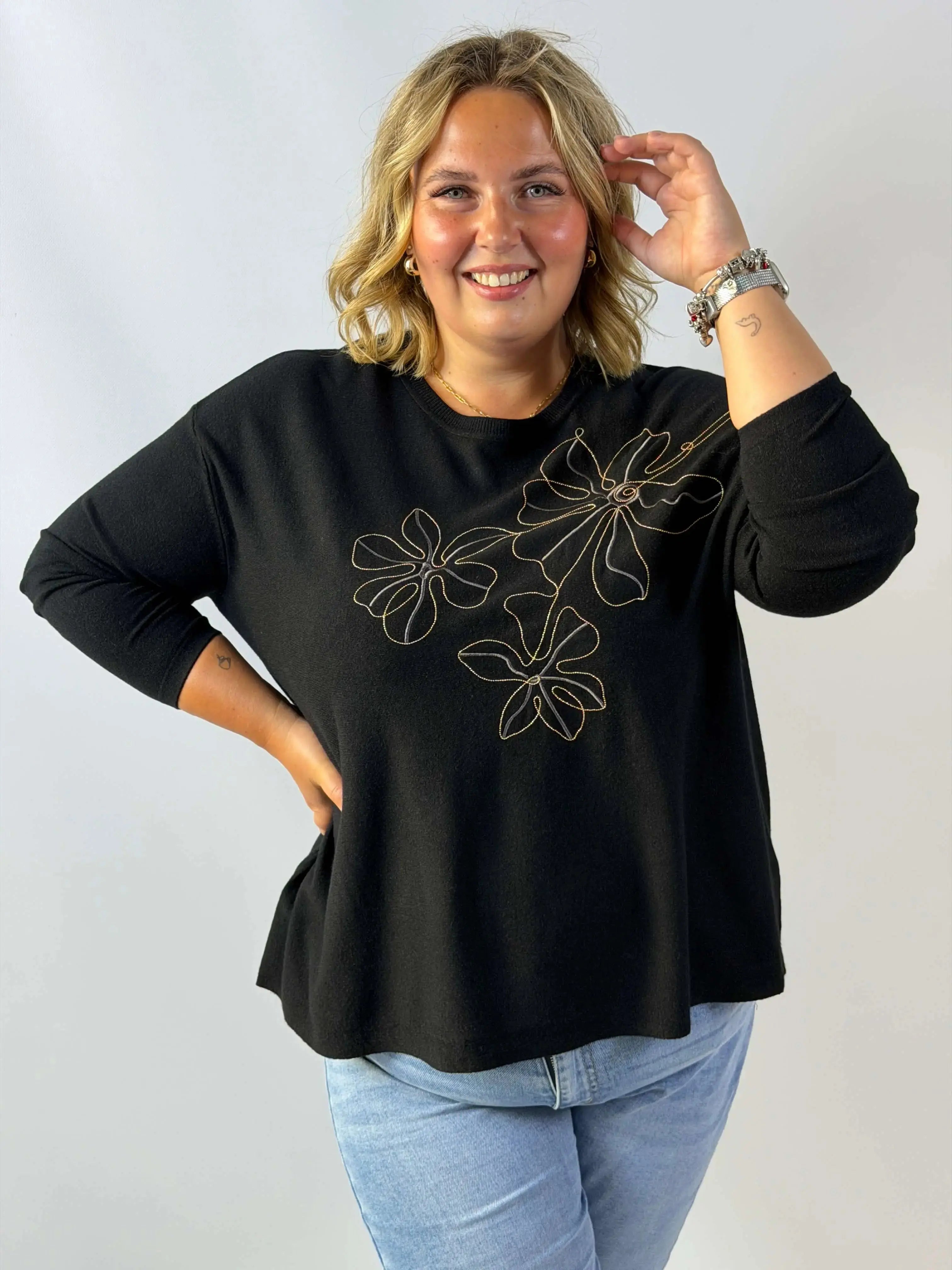 Bluzka sweterkowa Plus Size z efektownym haftem kwiatowym Stylowa XL