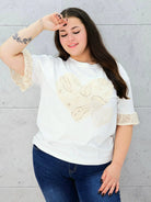 biała bluzka z sercem przodem 