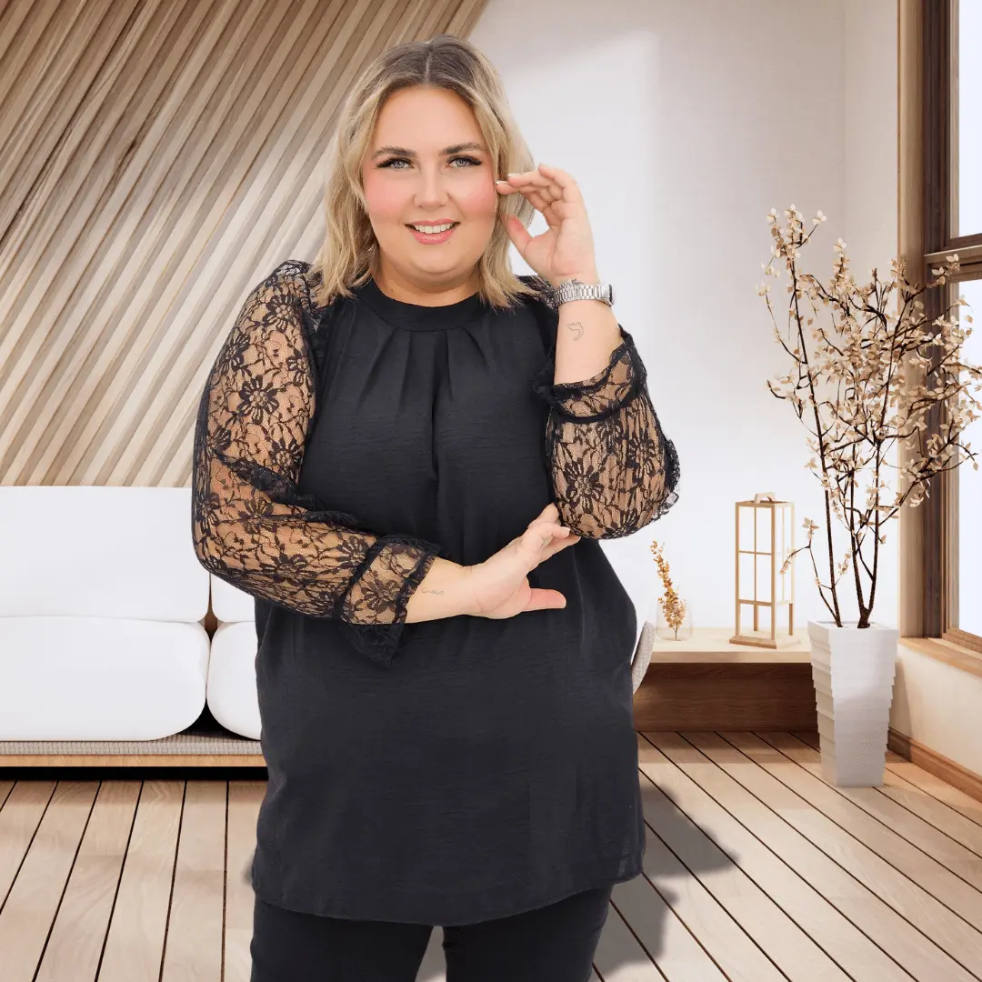 Bluzka z koronkowymi rękawami – elegancja w każdym detalu Stylowa XL