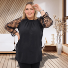 Bluzka z koronkowymi rękawami – elegancja w każdym detalu Stylowa XL