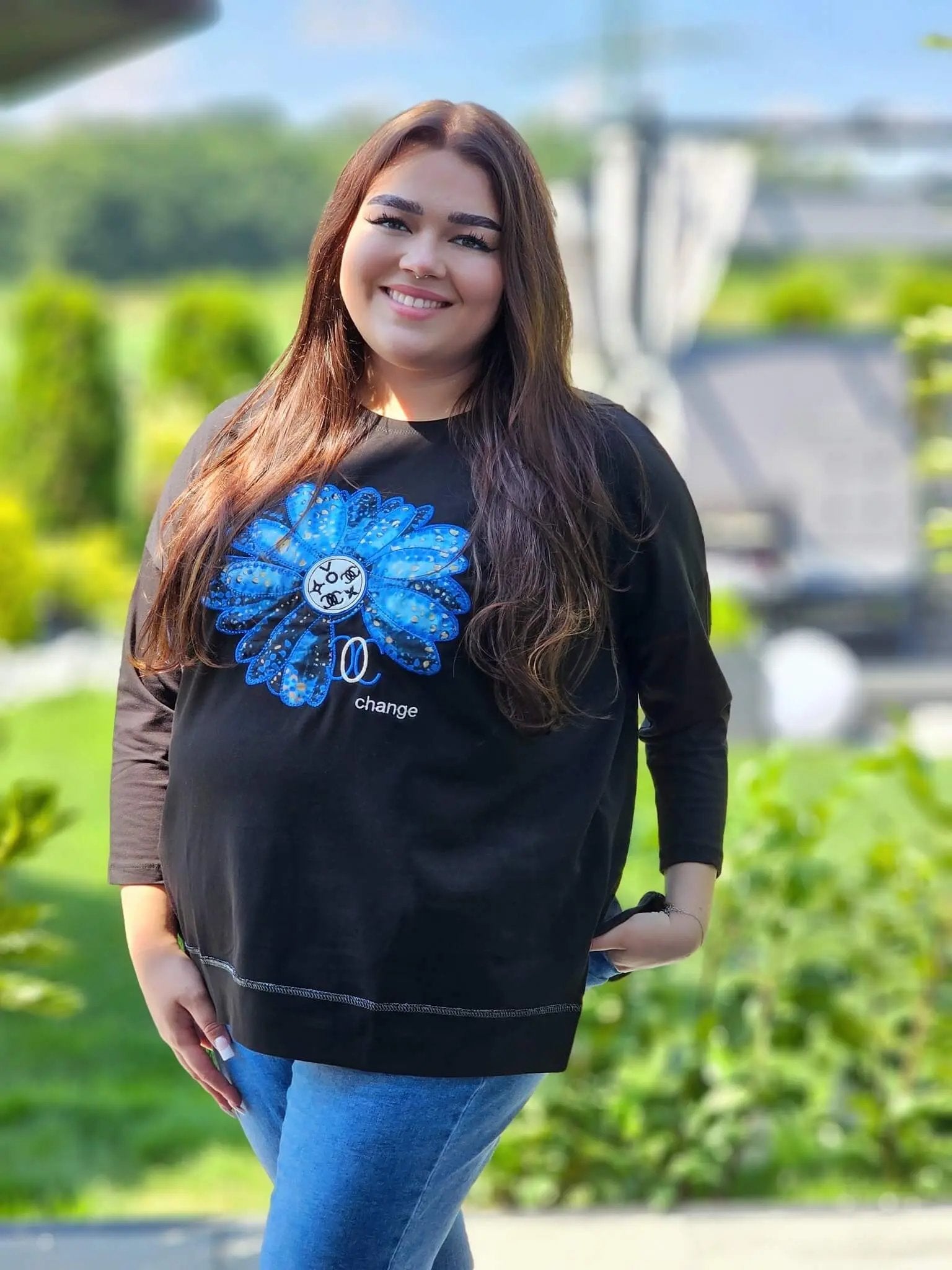 Bluzka z kwiatem Stylowa XL