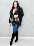 Ciepła kurtka plus size z kapturem w zwierzęcy wzór – styl i wygoda w jednym Stylowa XL